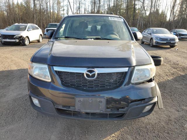 Photo 5 from auction – 2010 MAZDA TRIBUTE S with VIN 4F2CY0GG5AKM04703