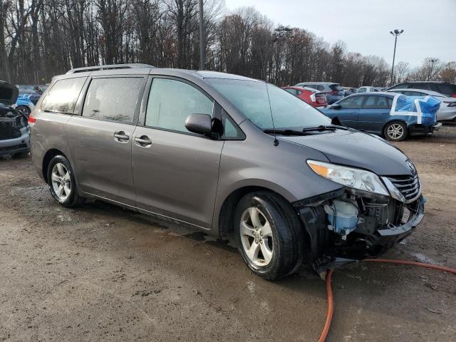 Photo 4 from auction – 2014 TOYOTA SIENNA LE with VIN 5TDKK3DC9ES460867