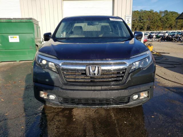 Photo 5 from auction – 2017 HONDA RIDGELINE with VIN 5FPYK3F60HB019954