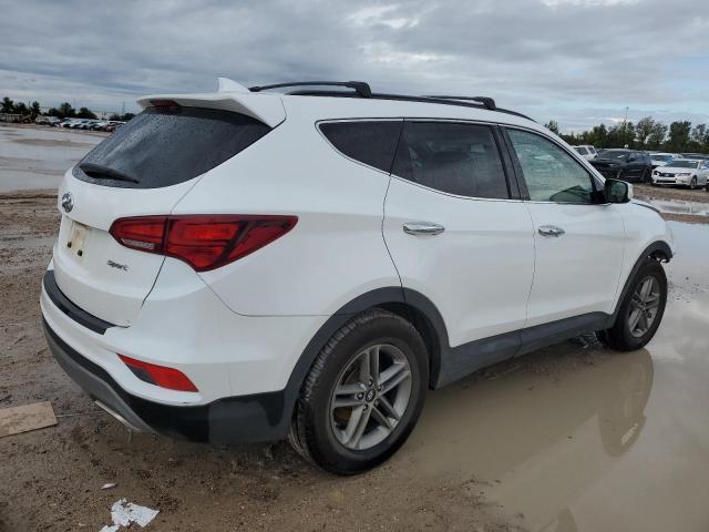 Photo 3 from auction – 2018 HYUNDAI SANTA FE S with VIN 5NMZU3LB7JH090338