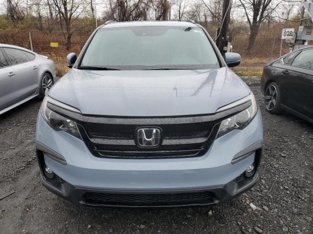 Photo 5 from auction – 2022 HONDA PILOT SE with VIN 5FNYF5H21NB032386