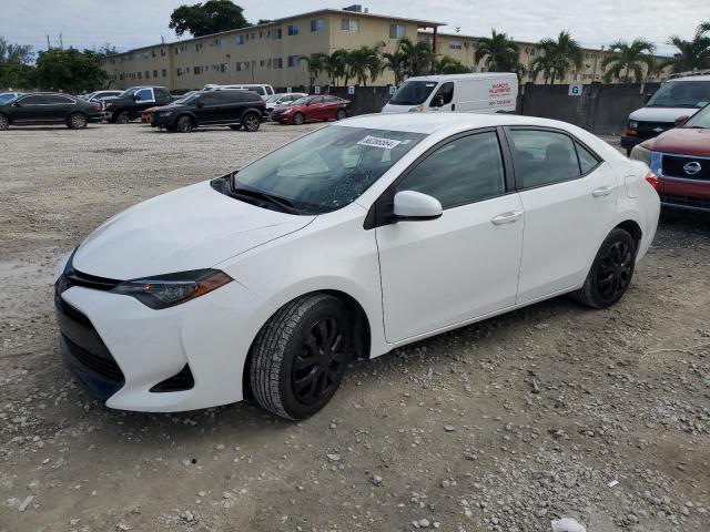 TOYOTA COROLLA L 2019 with VIN 5YFBURHE8KP878947 - Photo from auction