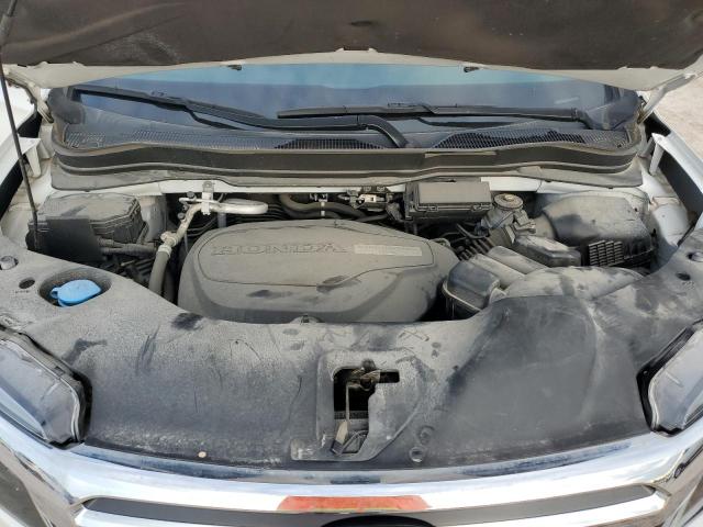 Photo 11 from auction – 2020 HONDA RIDGELINE with VIN 5FPYK3F13LB014518