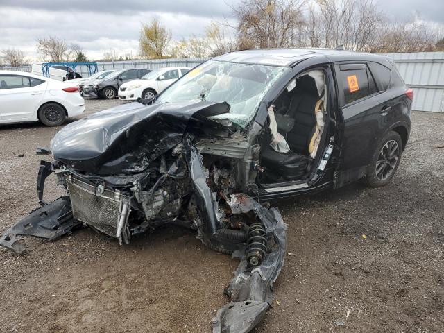 MAZDA CX-5 GT 2016 with VIN JM3KE4DY2G0834693 - Photo from auction