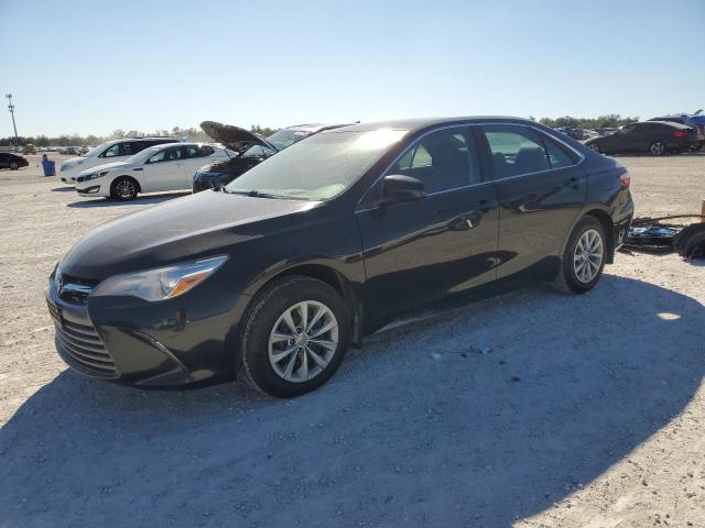 TOYOTA CAMRY LE 2017 with VIN 4T1BF1FKXHU370264 - Photo from auction