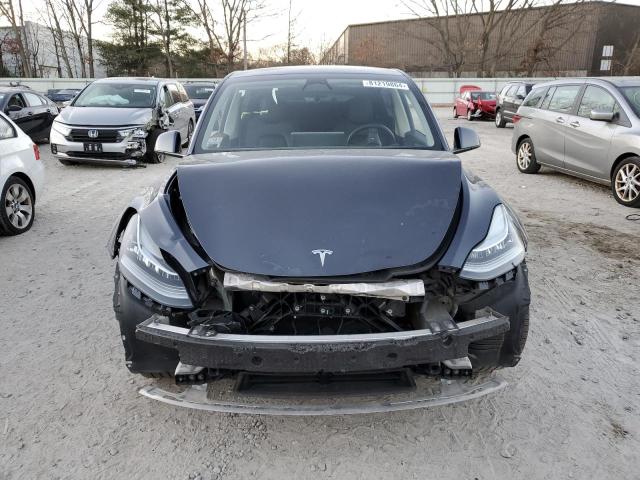 Photo 5 from auction – 2023 TESLA MODEL Y with VIN 7SAYGDEE4PA029572