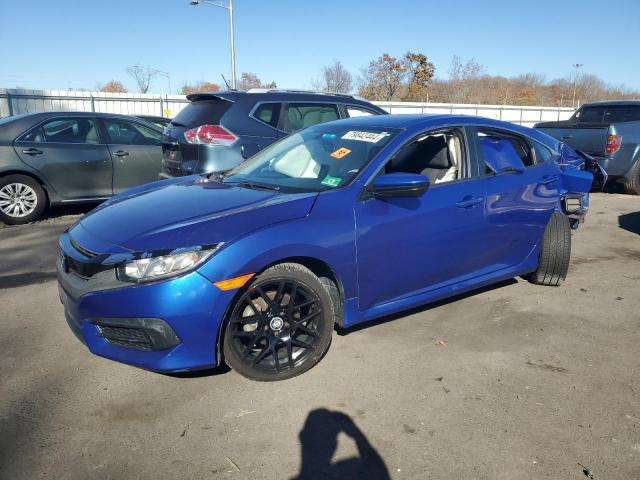 HONDA CIVIC LX 2018 with VIN 2HGFC2F55JH523674 - Photo from auction