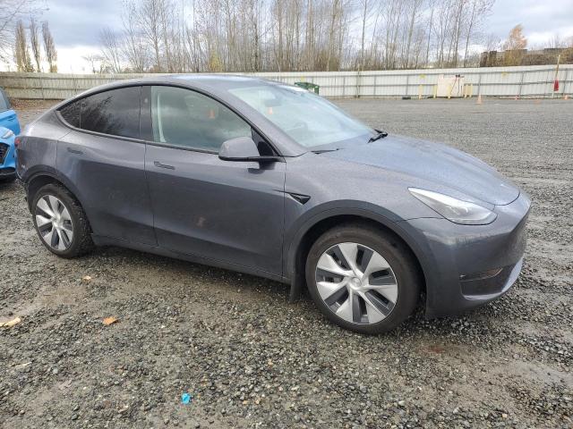 Photo 4 from auction – 2023 TESLA MODEL Y with VIN 7SAYGDED1PF966034