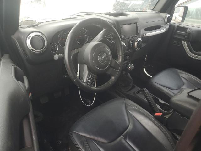 Photo 8 from auction – 2015 JEEP WRANGLER U with VIN 1C4BJWEG8FL664049