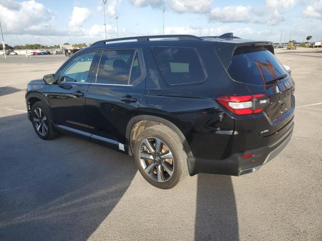 Photo 2 from auction – 2024 HONDA PILOT ELIT with VIN 5FNYG1H83RB033569