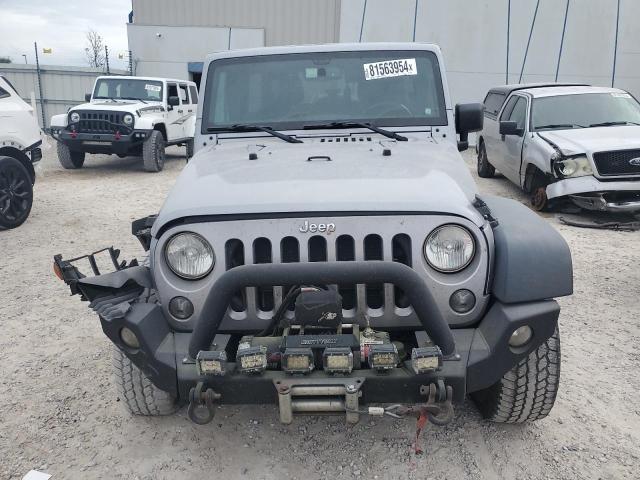 Photo 5 from auction – 2016 JEEP WRANGLER U with VIN 1C4BJWDG6GL123004