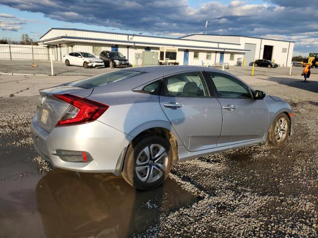 Photo 3 from auction – 2016 HONDA CIVIC LX with VIN 19XFC2F50GE240344