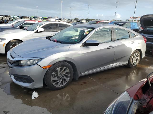 HONDA CIVIC EX 2018 with VIN 2HGFC2F77JH551381 - Photo from auction