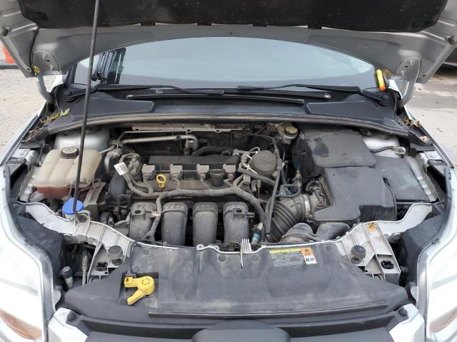 Photo 11 from auction – 2013 FORD FOCUS SE with VIN 1FADP3F28DL144042