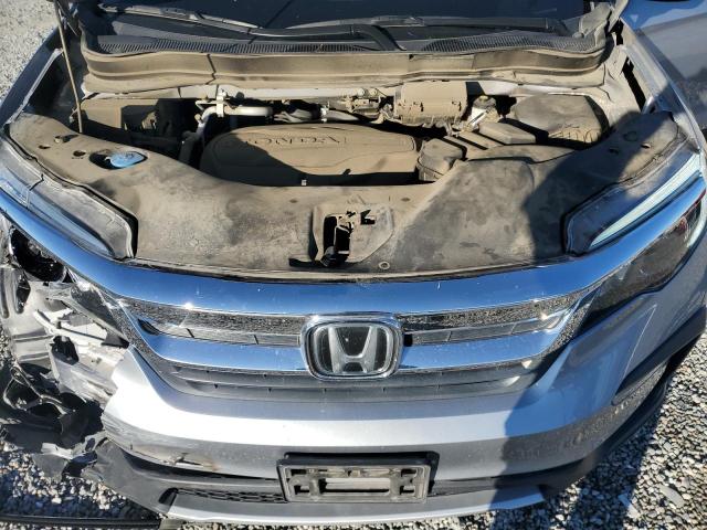 Photo 12 from auction – 2021 HONDA PILOT EX with VIN 5FNYF5H32MB007164