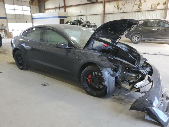 Photo 4 from auction – 2021 TESLA MODEL 3 with VIN 5YJ3E1EC4MF990908