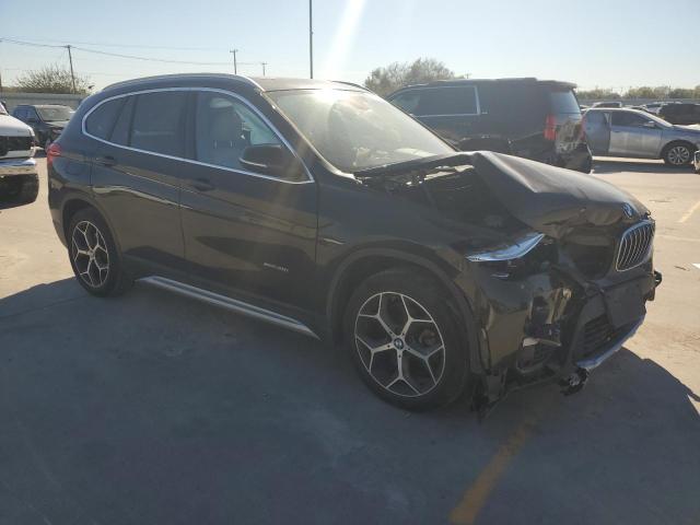 Photo 4 from auction – 2016 BMW X1 XDRIVE2 with VIN WBXHT3C31G5E50387