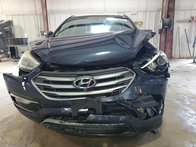 Photo 5 from auction – 2017 HYUNDAI SANTA FE S with VIN 5NMZU3LB0HH041170