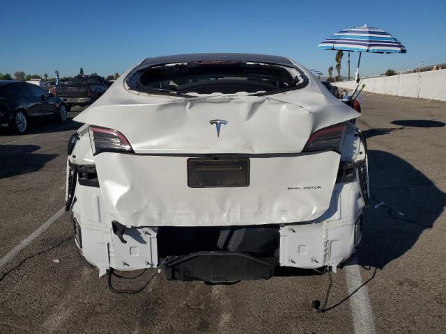 Photo 6 from auction – 2023 TESLA MODEL Y with VIN 7SAYGDEE1PA109007