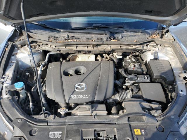 Photo 12 from auction – 2014 MAZDA CX-5 SPORT with VIN JM3KE2BE4E0334304