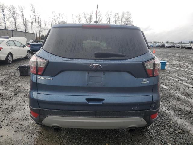 Photo 6 from auction – 2018 FORD ESCAPE SE with VIN 1FMCU9GD3JUC10113