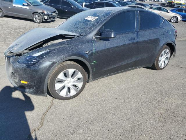 TESLA MODEL Y 2024 with VIN 7SAYGDED9RF094365 - Photo from auction