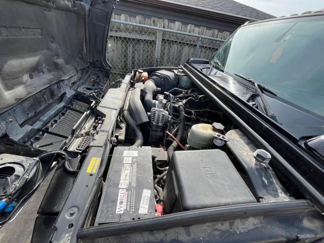 Photo 7 from auction – 2004 HUMMER H2 with VIN 5GRGN23U14H115951