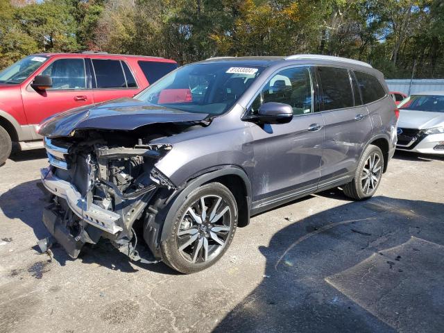 HONDA PILOT ELIT 2019 with VIN 5FNYF6H02KB002801 - Photo from auction