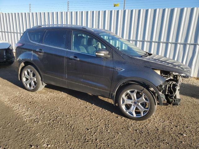 Photo 4 from auction – 2017 FORD ESCAPE TIT with VIN 1FMCU9J92HUE60313