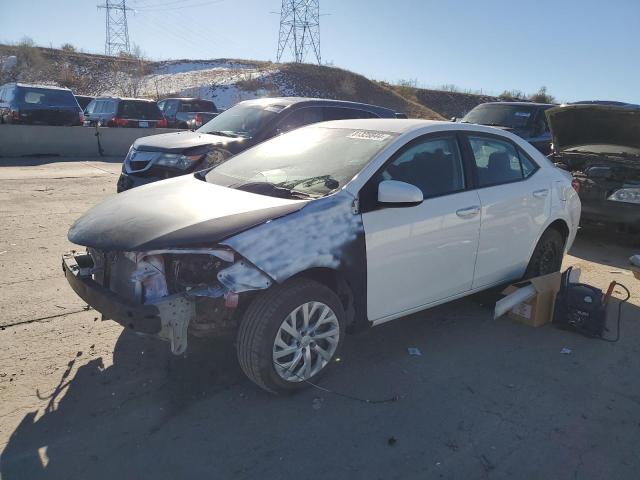 TOYOTA COROLLA L 2017 with VIN 5YFBURHE7HP712427 - Photo from auction