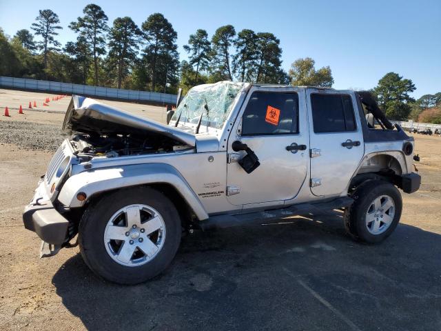 JEEP WRANGLER U 2011 with VIN 1J4BA5H13BL627321 - Photo from auction