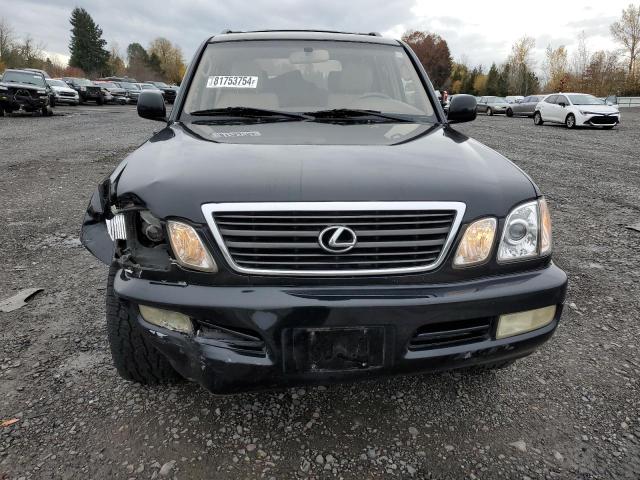 Photo 5 from auction – 1999 LEXUS LX 470 with VIN JT6HT00W2X0032027