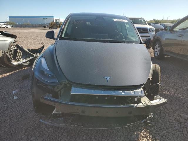 Photo 5 from auction – 2023 TESLA MODEL Y with VIN 7SAYGDED3PF962602