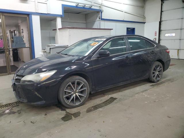 TOYOTA CAMRY LE 2017 with VIN 4T1BF1FKXHU684304 - Photo from auction