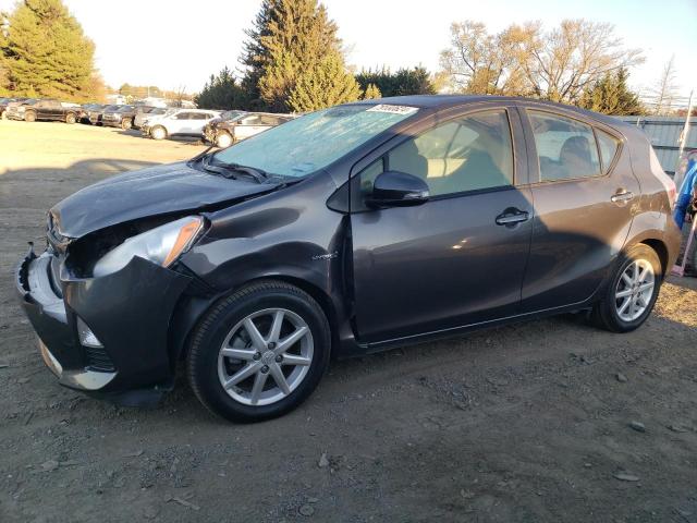 TOYOTA PRIUS C 2014 with VIN JTDKDTB35E1063229 - Photo from auction