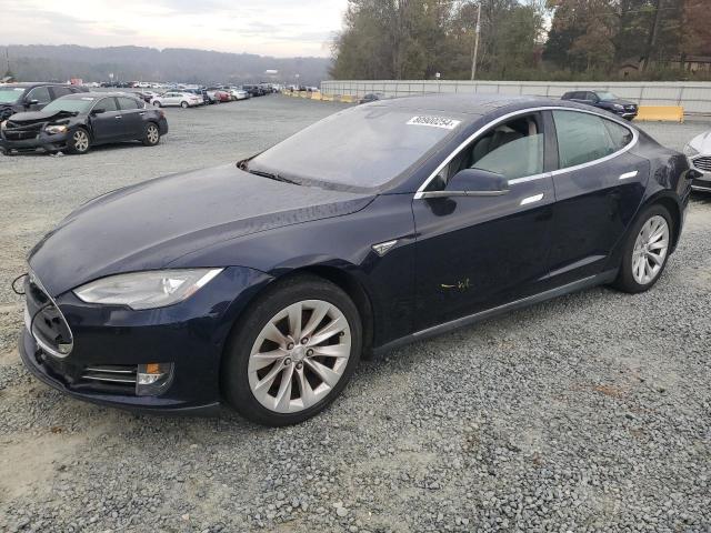 TESLA MODEL S 2014 with VIN 5YJSA1H14EFP54942 - Photo from auction
