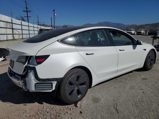 Снимка 3 от търг – 2022 TESLA MODEL 3 с VIN 5YJ3E1EA3NF101662