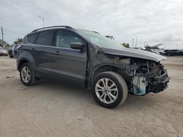Photo 4 from auction – 2018 FORD ESCAPE SE with VIN 1FMCU0GD3JUB36347