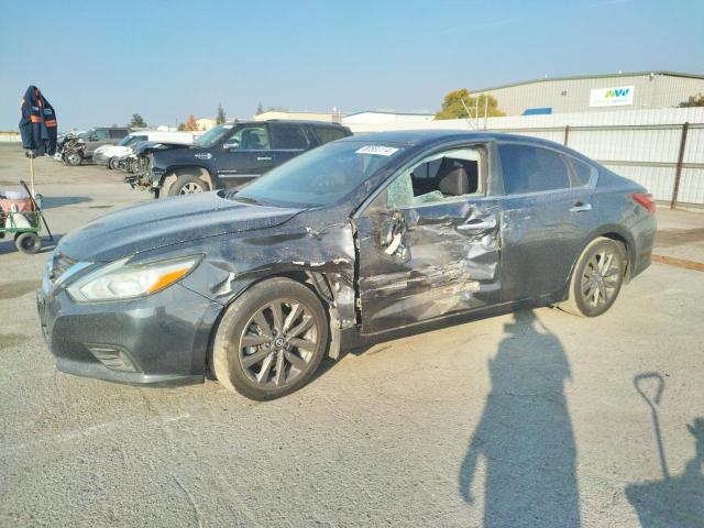 NISSAN ALTIMA 2.5 2018 with VIN 1N4AL3AP9JC208568 - Photo from auction