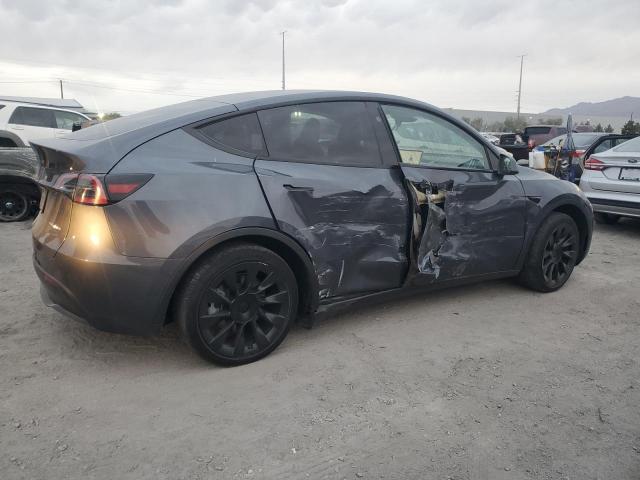 Photo 3 from auction – 2023 TESLA MODEL Y with VIN 7SAYGAEE1PF890855