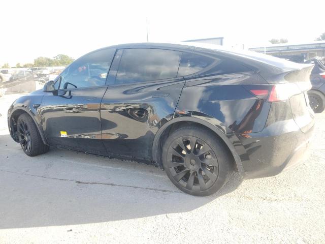 Photo 2 from auction – 2023 TESLA MODEL Y with VIN 7SAYGAEE2PF668907