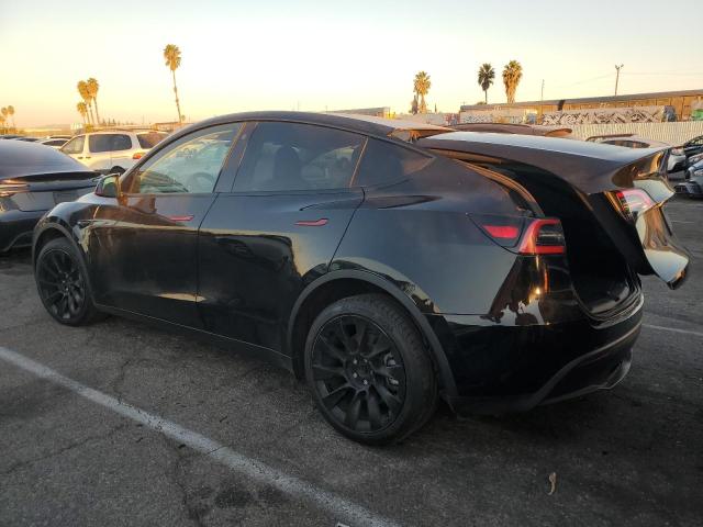 Photo 2 from auction – 2021 TESLA MODEL Y with VIN 5YJYGDEE6MF088196