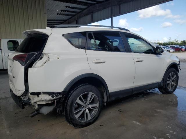 Photo 3 from auction – 2017 TOYOTA RAV4 XLE with VIN JTMWFREV9HD099049