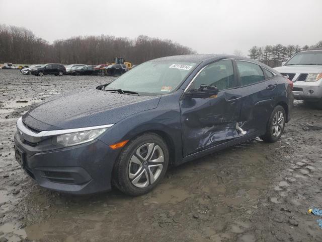 HONDA CIVIC LX 2017 with VIN 19XFC2F51HE207063 - Photo from auction