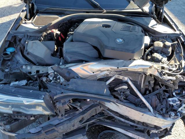 Photo 11 from auction – 2021 BMW 330I with VIN 3MW5R1J08M8B90803