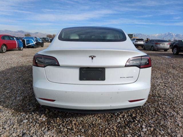 Photo 6 from auction – 2021 TESLA MODEL 3 with VIN 5YJ3E1EB9MF876071