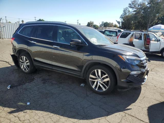 Photo 4 from auction – 2017 HONDA PILOT TOUR with VIN 5FNYF6H93HB075490