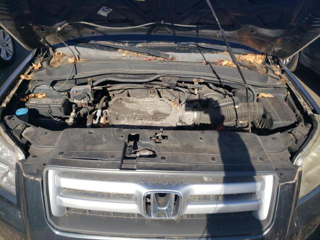 Photo 11 from auction – 2006 HONDA PILOT EX with VIN 2HKYF184X6H558092
