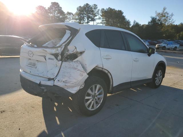 Photo 3 from auction – 2014 MAZDA CX-5 TOURI with VIN JM3KE2CY6E0310529