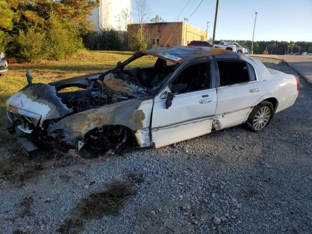 LINCOLN TOWN CAR E 2003 with VIN 1LNHM81W73Y642001 - Photo from auction